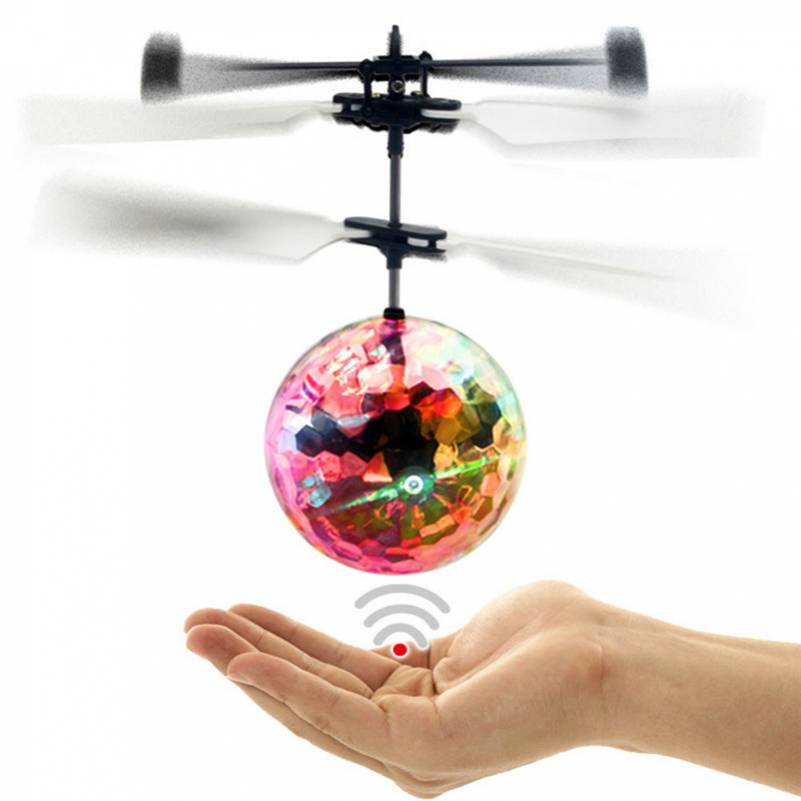 juego interior y exterior RC Flying Ball Toys música discoteca incorporada con iluminación LED brillante bola de luz recargable Drone helicóptero de inducción infrarroja con mando a distancia 
