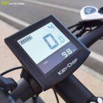 affordable electric bike in green color with digital panel